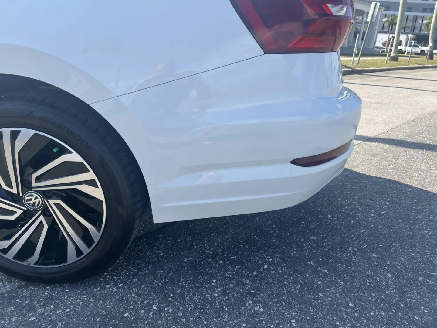 White car rear with stylish wheel design.